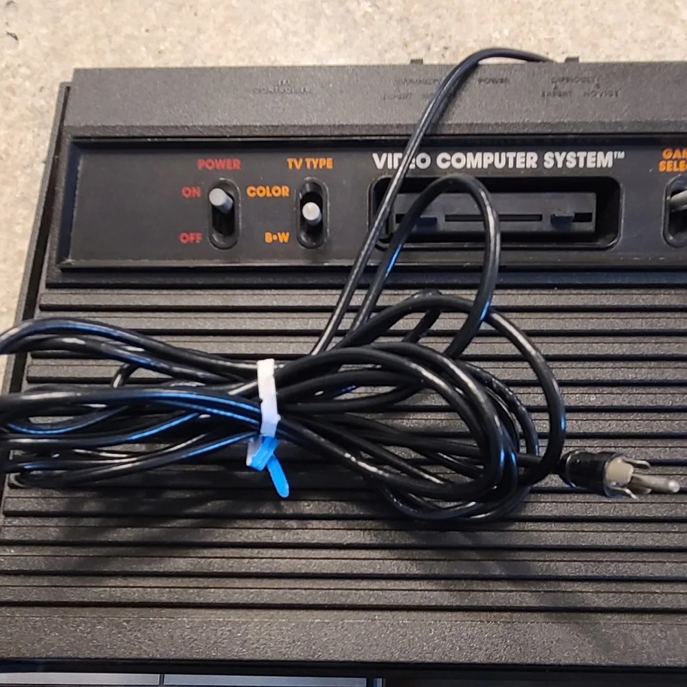 Atari Black Video Game Console with Controllers